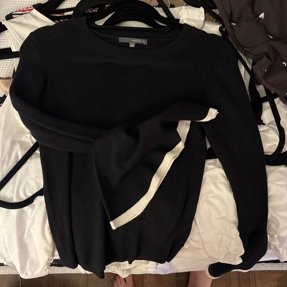 Matty m: Black ribbed top with fun sleeves and white detailing